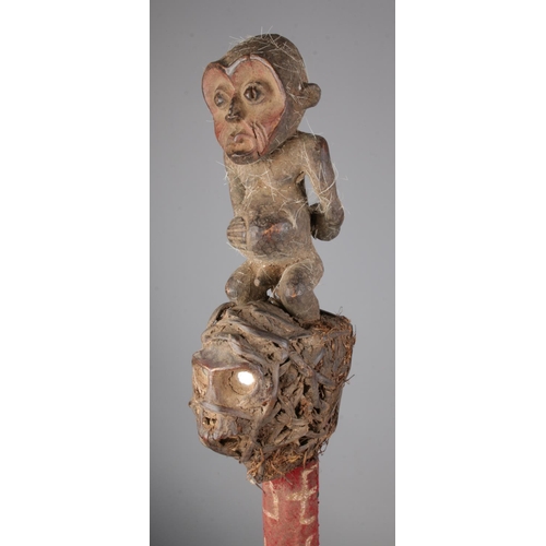 490 - A Yoruba tribal wooden carved scepter with a carved kneeling man and bound mud packed shrunken head ... 