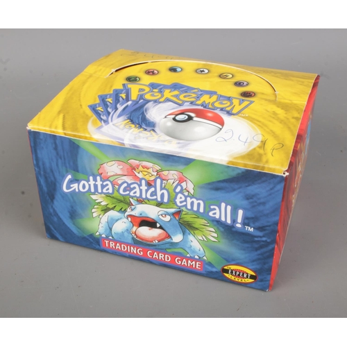 491 - A Pokemon Base Set Booster Box 1999 Wizards Of The Coast (empty) together with Pokemon The Story So ... 