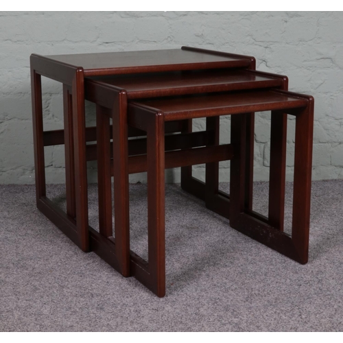 523 - A nest of three teak G Plan tables