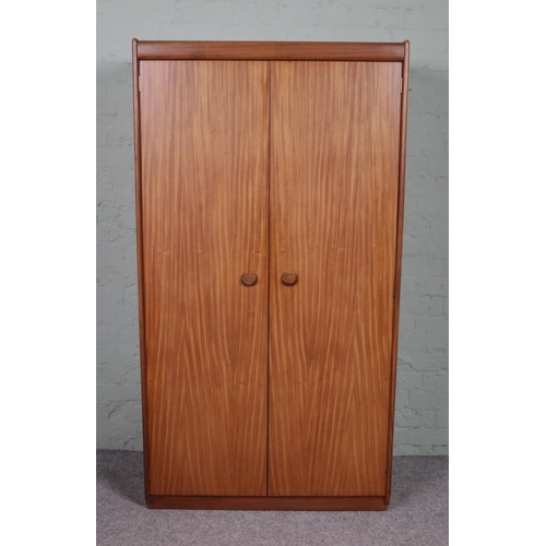 524 - A two door White & Newton Selbourne wardrobe with five drawers to the interior. 173cm x 93cm x 58cm.