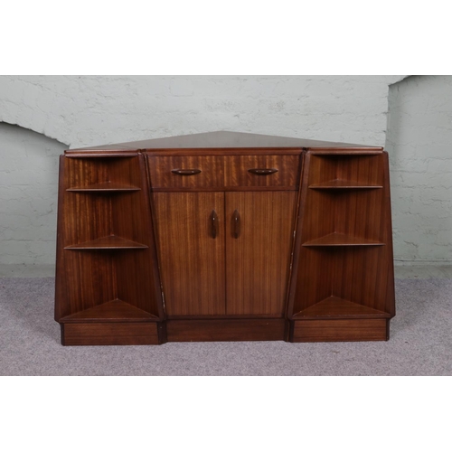 527 - G-Plan teak corner bureau with pull out desk above two cupboard doors flanked by its matching shelvi... 