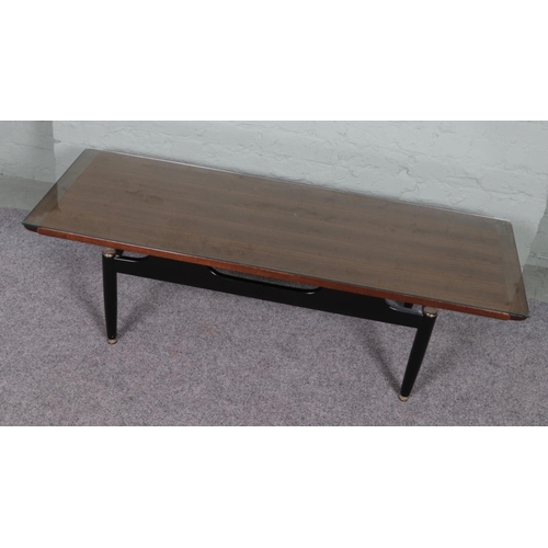 529 - A G Plan E Gomme long teak and ebonised coffee table with glass top. 


Hx40cm
Wx137cm
Dx50cm