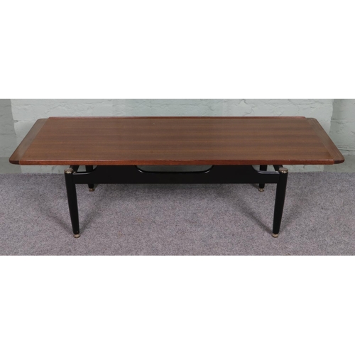 529 - A G Plan E Gomme long teak and ebonised coffee table with glass top. 


Hx40cm
Wx137cm
Dx50cm