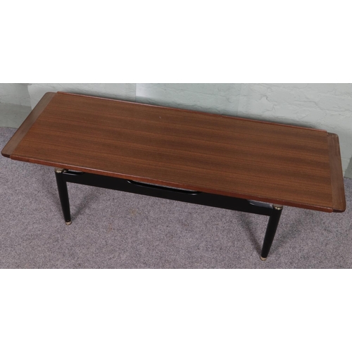 529 - A G Plan E Gomme long teak and ebonised coffee table with glass top. 


Hx40cm
Wx137cm
Dx50cm