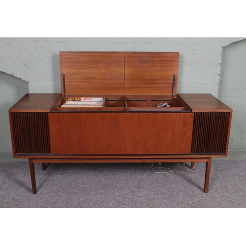 533 - A Mid century teak cased radiogram with Garrard AT6 turntable and Beomaster 900 stereo including a s... 