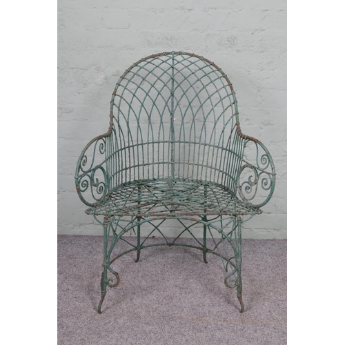 543 - A French wire work garden chair