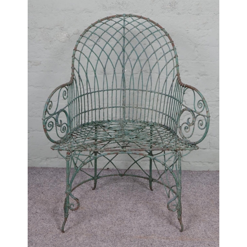 543 - A French wire work garden chair