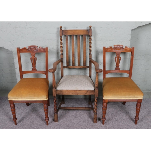 548 - A barley twist design carver chair with two other upholstered dining chairs