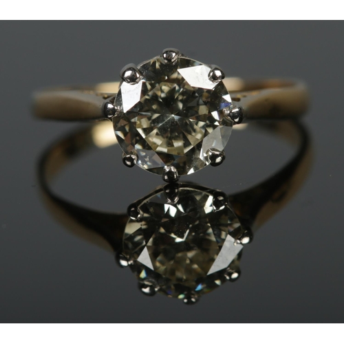 108 - A vintage 18ct yellow gold diamond solitaire ring. Diamond just under 1.5ct. Size I. 1.84g.