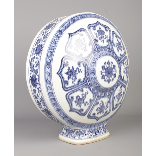 11 - A Bajixiang blue and white moon flask, bearing Kangxi reign marks to base. Height 41cm.