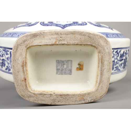 11 - A Bajixiang blue and white moon flask, bearing Kangxi reign marks to base. Height 41cm.