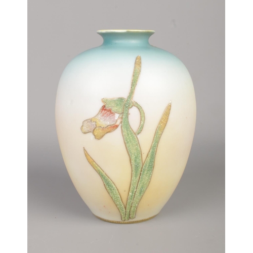 12 - A Japanese coralene vase decorated with orchids. Height 16.5cm.