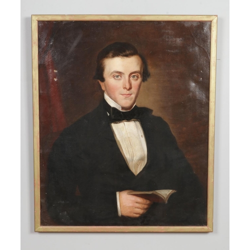 124 - A 19th century gilt framed oil on canvas, portrait of a smartly dressed gentleman holding a book. 74... 