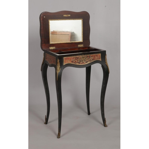 138 - A 19th century ebonised rosewood vanity table. Having boulle work decoration. Height 73.5cm, Width 5... 