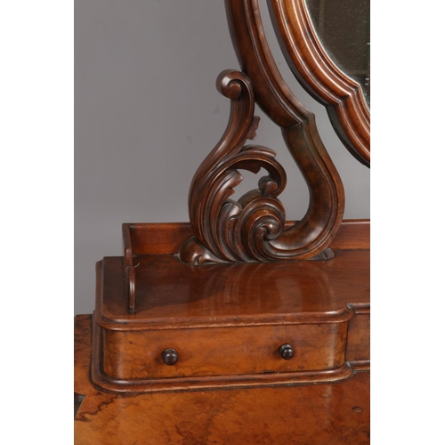 145 - A Victorian walnut Duchess dressing table.