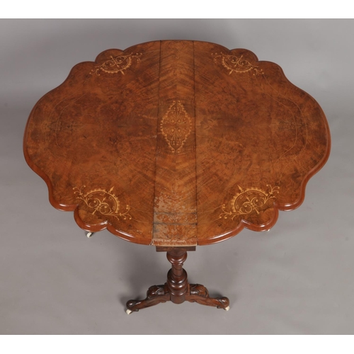 149 - A Victorian walnut Sutherland table with marquetry inlaid decoration. Top 105cm x 92cm.