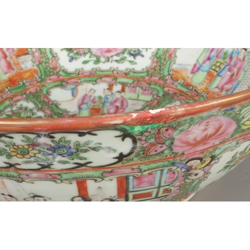 2 - A large Chinese Cantonese bowl. Decorated in coloured enamels with foliage and panels depicting figu... 