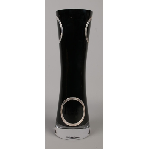 27 - A black art glass vase with applied silver ring decoration. Assayed Sheffield 2010 by Carr's of Shef... 