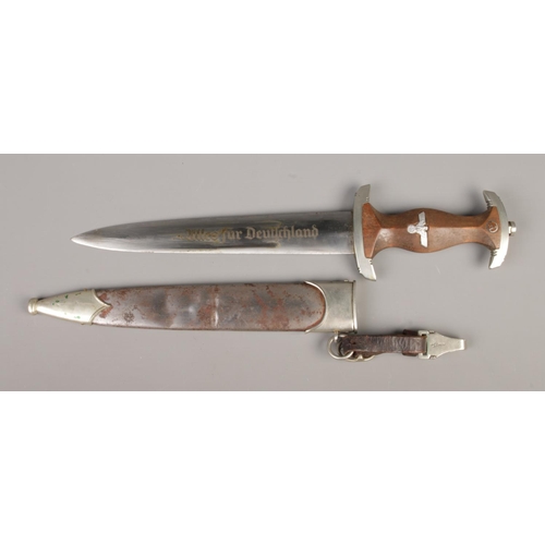 33 - A German Third Reich SA dagger and scabbard. The blade etched Alles Fur Deutschland and bearing Carl... 