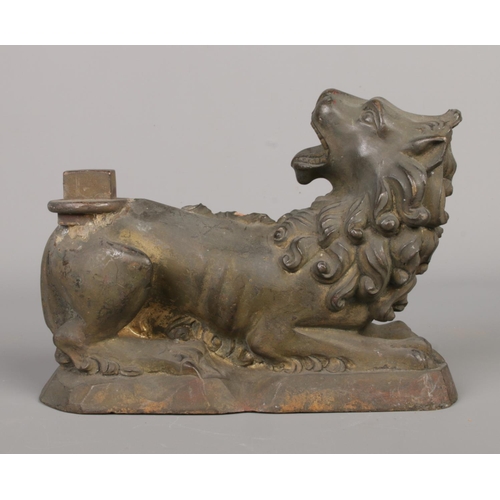 39 - A bronze casting pattern of recumbent lion, possibly for a fire dog/andiron. Height 13cm, Length 18c... 