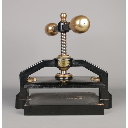 43 - A cast iron and brass book press by Pawson & Brailsford, Sheffield.