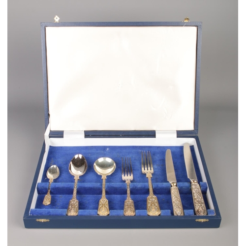 49 - A cased seven piece cutlery sample, purportedly made for an Arabian Palace. Having gilt patterned ha... 