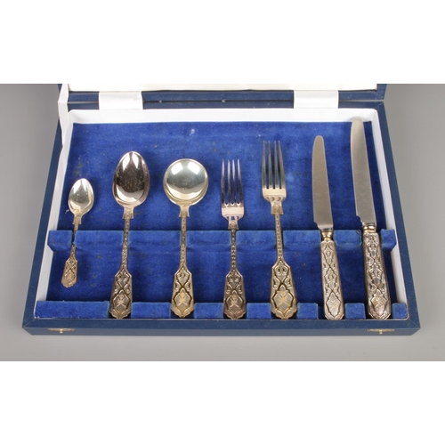 49 - A cased seven piece cutlery sample, purportedly made for an Arabian Palace. Having gilt patterned ha... 