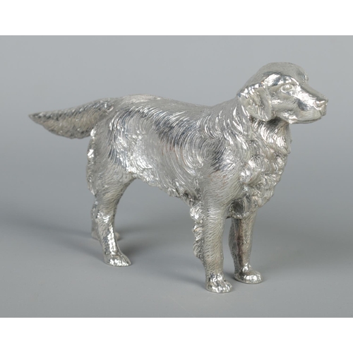 60 - A silver plated model of a Golden Retriever dog. Height 9.5cm, Length 15.5cm.