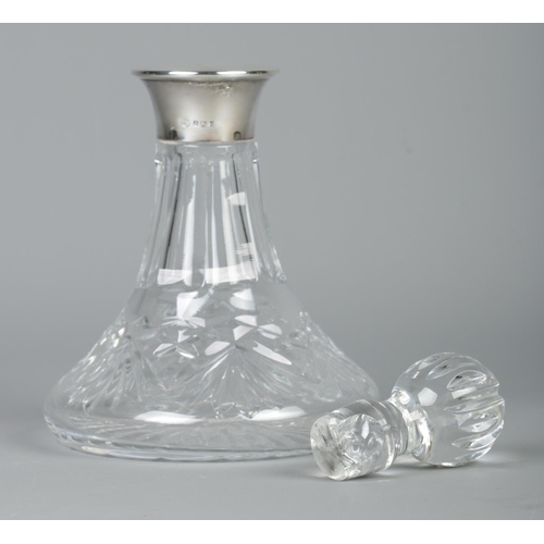 66 - A miniature cut glass ships decanter with silver collar. Assayed Birmingham 1997 by Albert Edward Jo... 