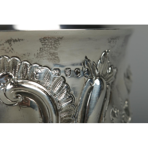 68 - A George III small silver pedestal bowl with repousse decoration. Assayed London 1818 by Rebecca Eme... 