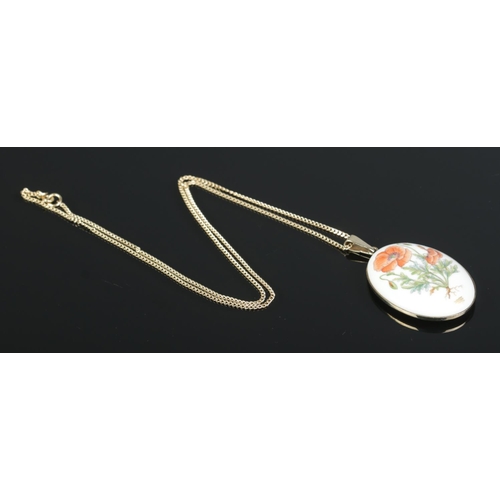 97 - A Danish silver gilt and porcelain pendant by Georg Jensen/Royal Copenhagen on 9ct yellow gold chain... 