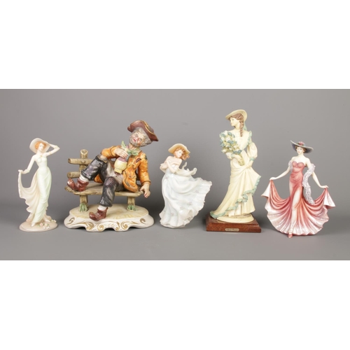 174 - A collection of vintage figurines, including Capodimonte, ADL Vittorio Tessaro and three lady figuri... 