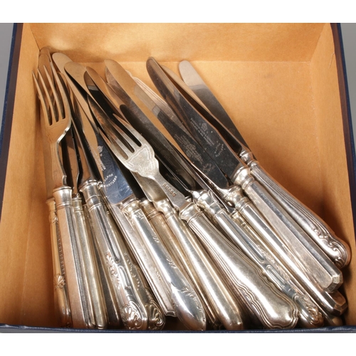 177 - A collection of silver plated flatware, including a group of eighteen knives by Harrison Bros & Hows... 