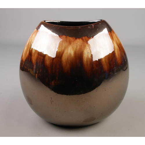 180 - A Poole Pottery vase with brown and iridescent glazes.

Hx27cm