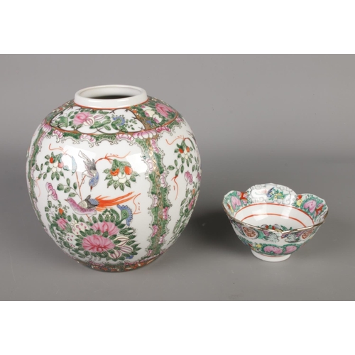 216 - An antique Chinese famille rose ginger jar paired with a famille rose floral porcelain bowl.