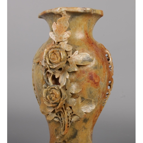 221 - Three large Chinese soapstone pieces, featuring a hand-carved rose vase with a wooden appearance sto... 