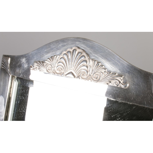 227 - A large silver plate easel dressing table bevel edge mirror bearing shell motif to frame. Approx. di... 