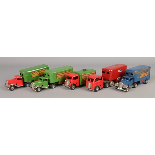 249 - Five Tri-ang Minic 'Minic Transport' delivery vans and wagons. One with box.