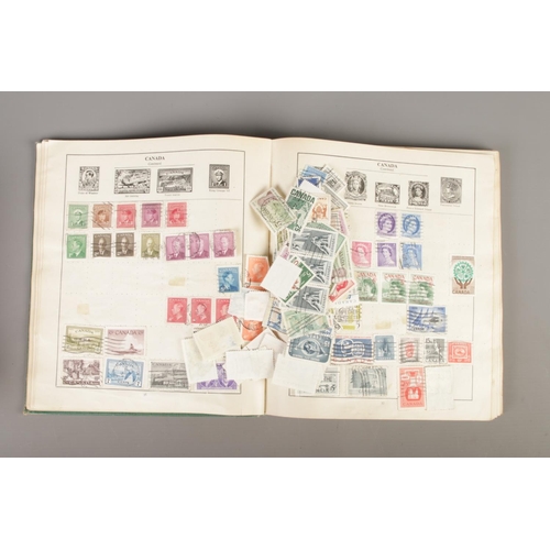 269 - Philatelist interest; A Strand stamp album with contents of world stamps, Scott's Standard Postage S... 