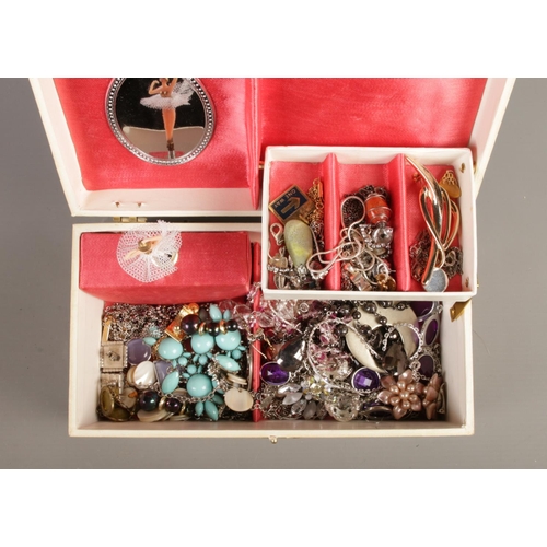 279 - Two jewellery boxes containing a large collection of costume jewellery. Includes dress rings, identi... 