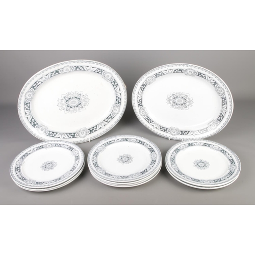 298 - A collection of antique J Jackson J.J & Co Berlin plates including two large platters.