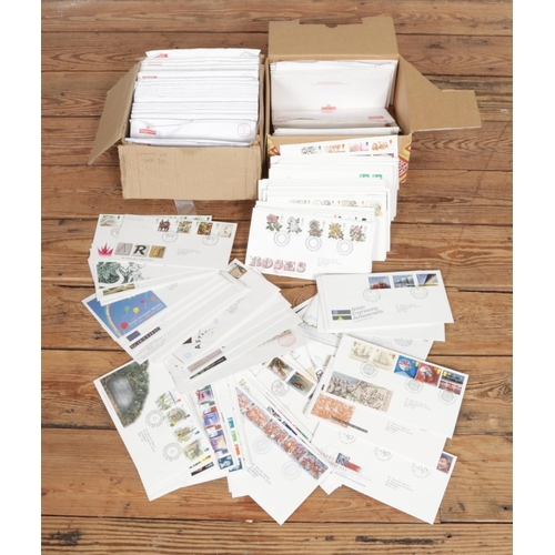 303 - A large quantity of first day covers including Millennium first day covers, Pub Signs, Golden Jubile... 