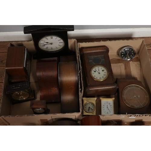 327 - Two boxes of assorted mechanical and quartz clocks to include Westclox, Cyma, Smiths, Ingersoll, Gar... 