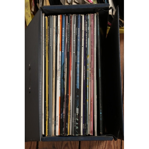 329 - A case of assorted vinyl LP records and three boxes of vinyl singles of mainly rock and pop to inclu... 