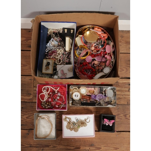 341 - A large box of assorted costume jewellery and accessories. To include wristwatches, necklaces, bangl... 