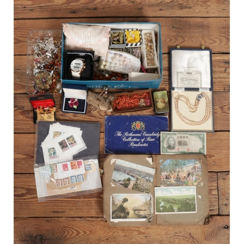 343 - A box of costume jewellery and assorted items, to include beaded necklaces, coral and amber coloured... 