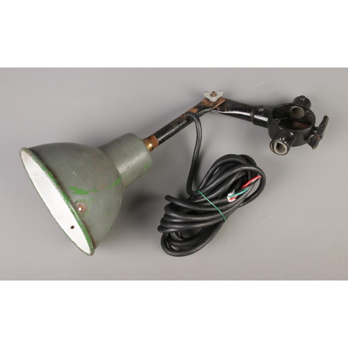 360 - A mid 20th century industrial anglepoise lamp with green enamel shade.