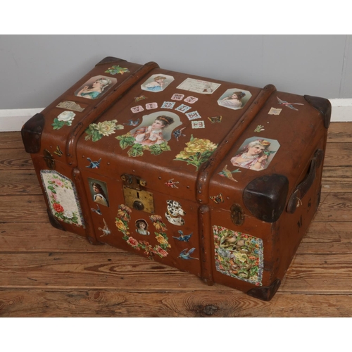 367 - A vintage steamer trunk bearing M.S initials to side and decoupaged using assorted Victorian scraps.