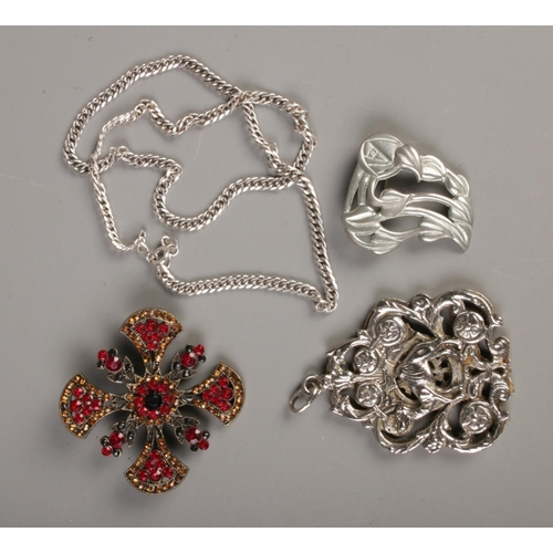 405 - An Ortak white metal brooch with two other brooches and a silver chain