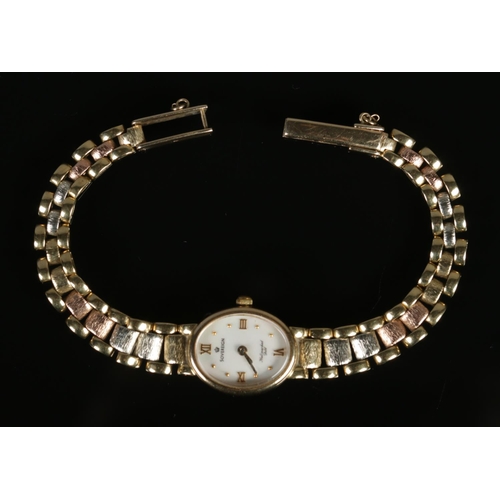 425 - A ladies 9ct gold Sovereign quartz wristwatch with mother of pearl face on 9ct gold tri-colour strap... 